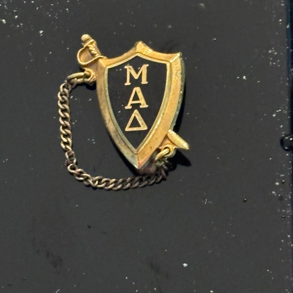 Gold and Black Shield fraternity pin from 1965